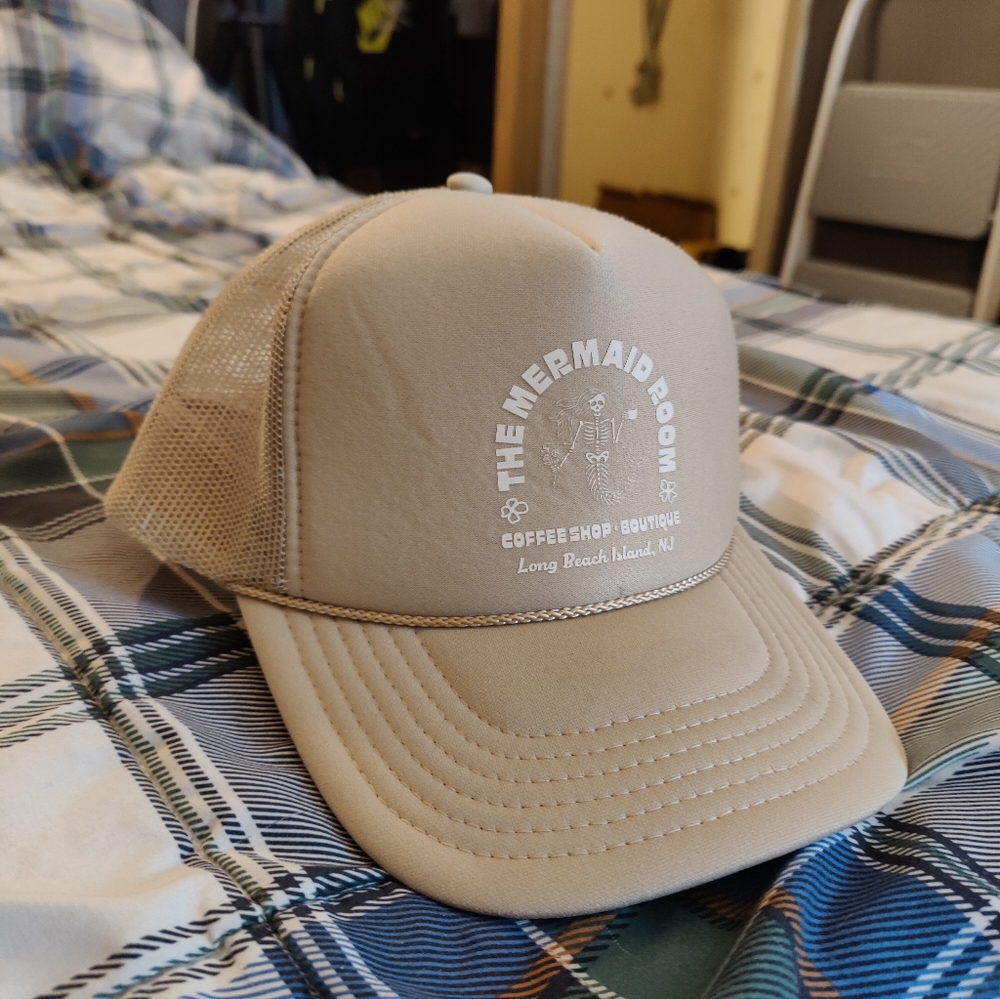 The mermaid room trucker hat